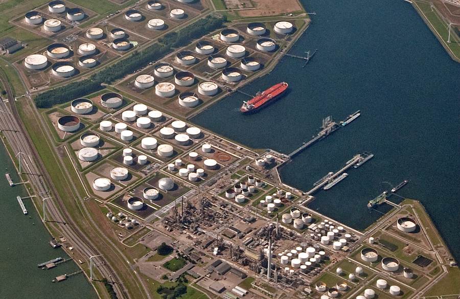 Rotterdam oil tanks and tanker illustrating Iran war energy prices in the developing countries debt crisis 2026