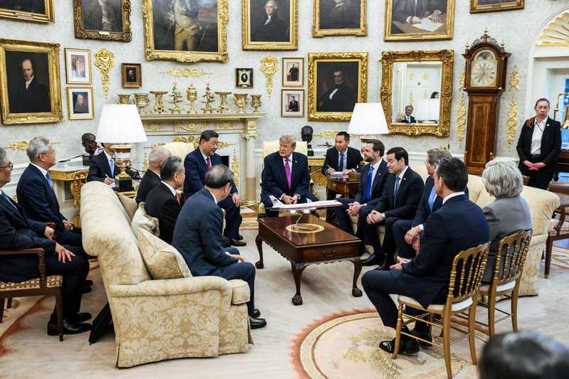 President Donald Trump in the Oval Office during the Trump Russia plague China comparison debate