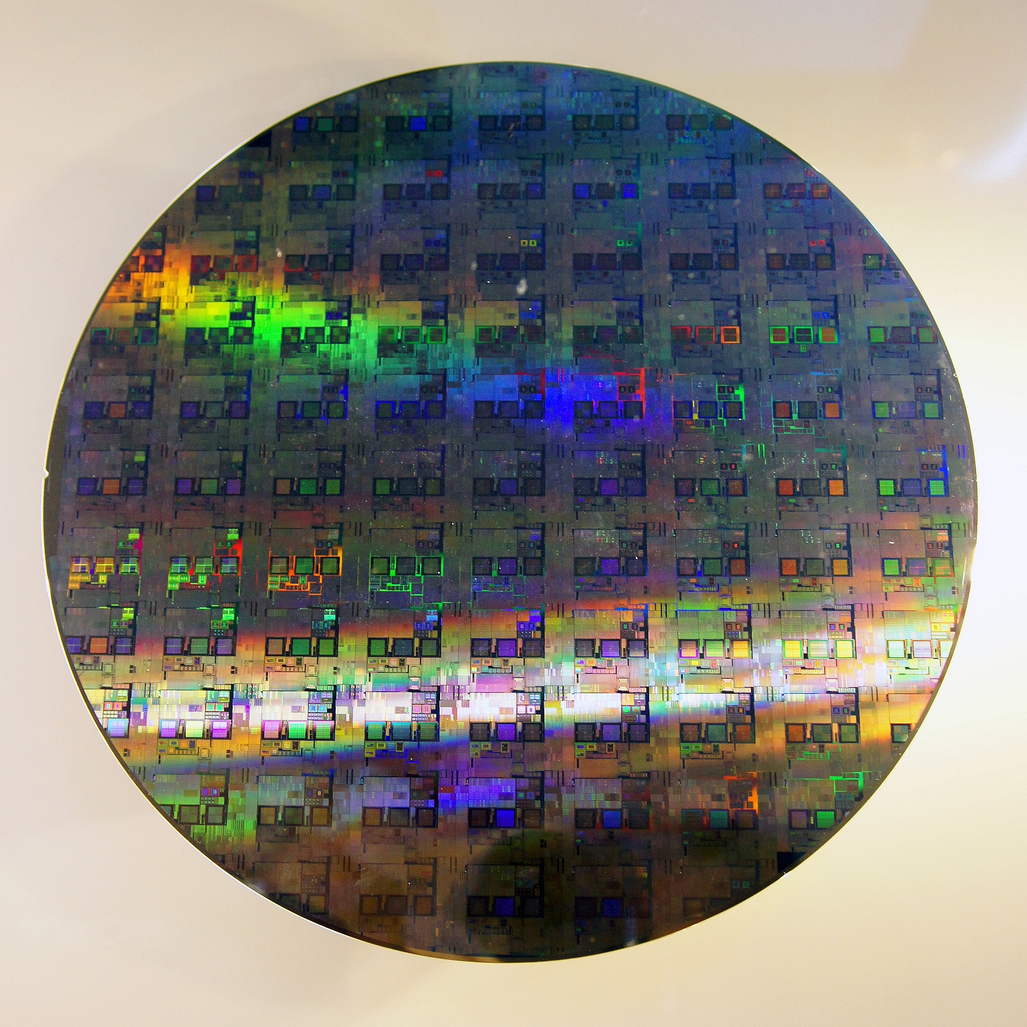 A 12-inch silicon wafer — file photo for chip stocks SOXX reversing higher in stock market today October 20 2026