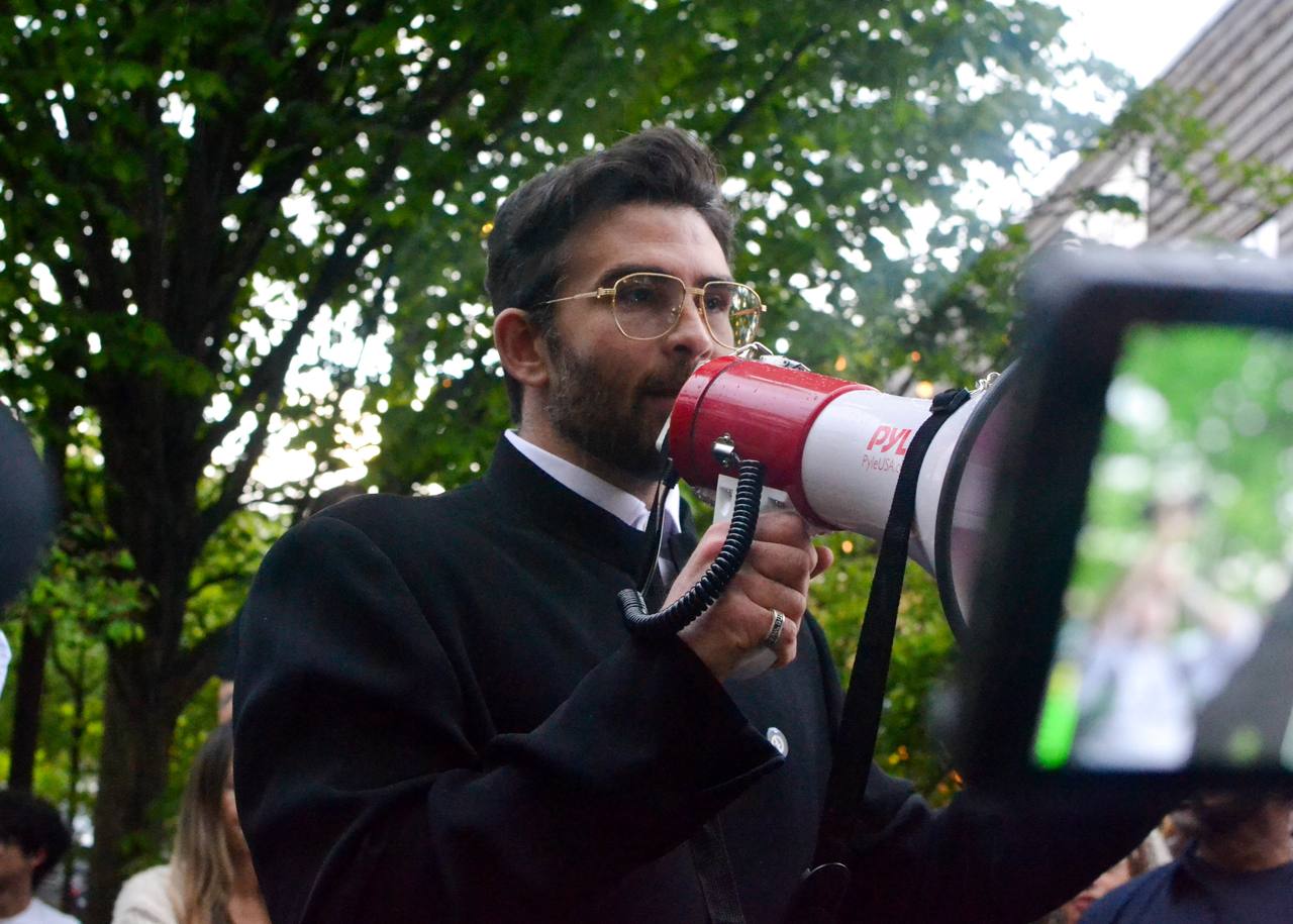 Streamer Hasan Piker speaking at a public event — he joined a 'from the river to the sea' chant at Cornell's Sage Chapel on September 24, 2026.