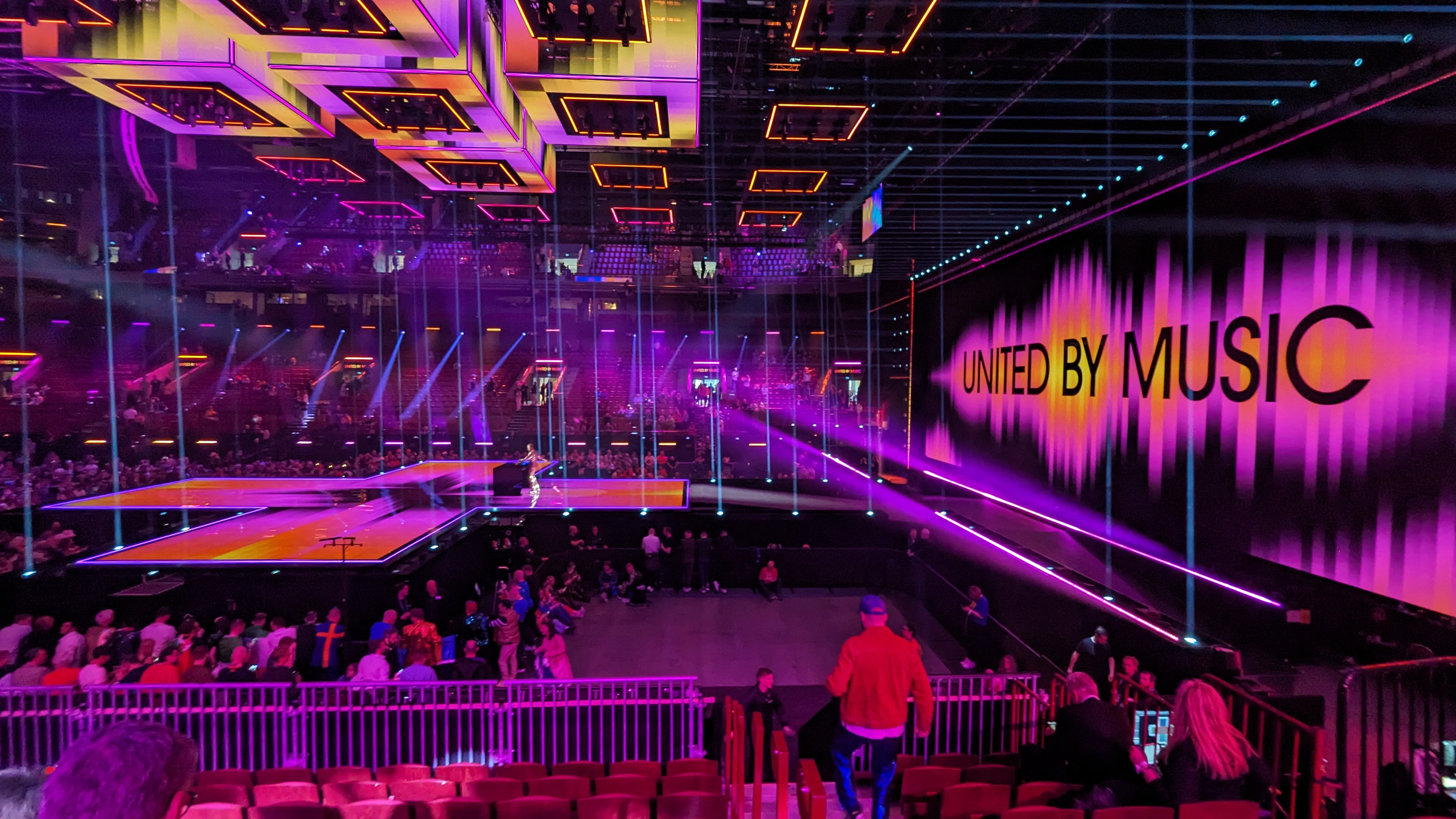 The Eurovision Song Contest stage lit in purple and orange beneath a United by Music banner, ahead of the Eurovision 2027 Canada debut in Burgas
