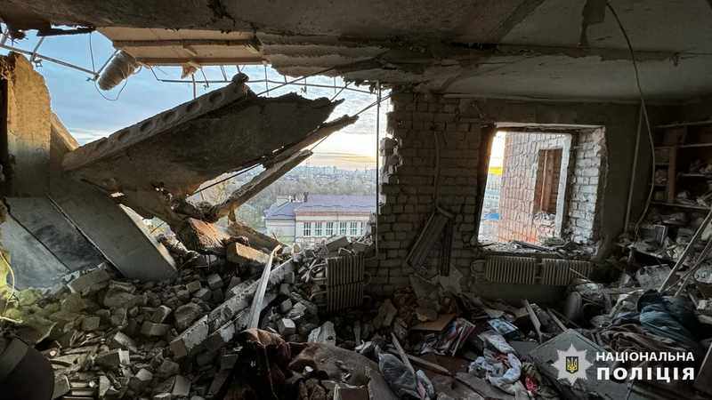 Collapsed concrete and bricks inside a heavily damaged Kharkiv apartment after a Russian attack