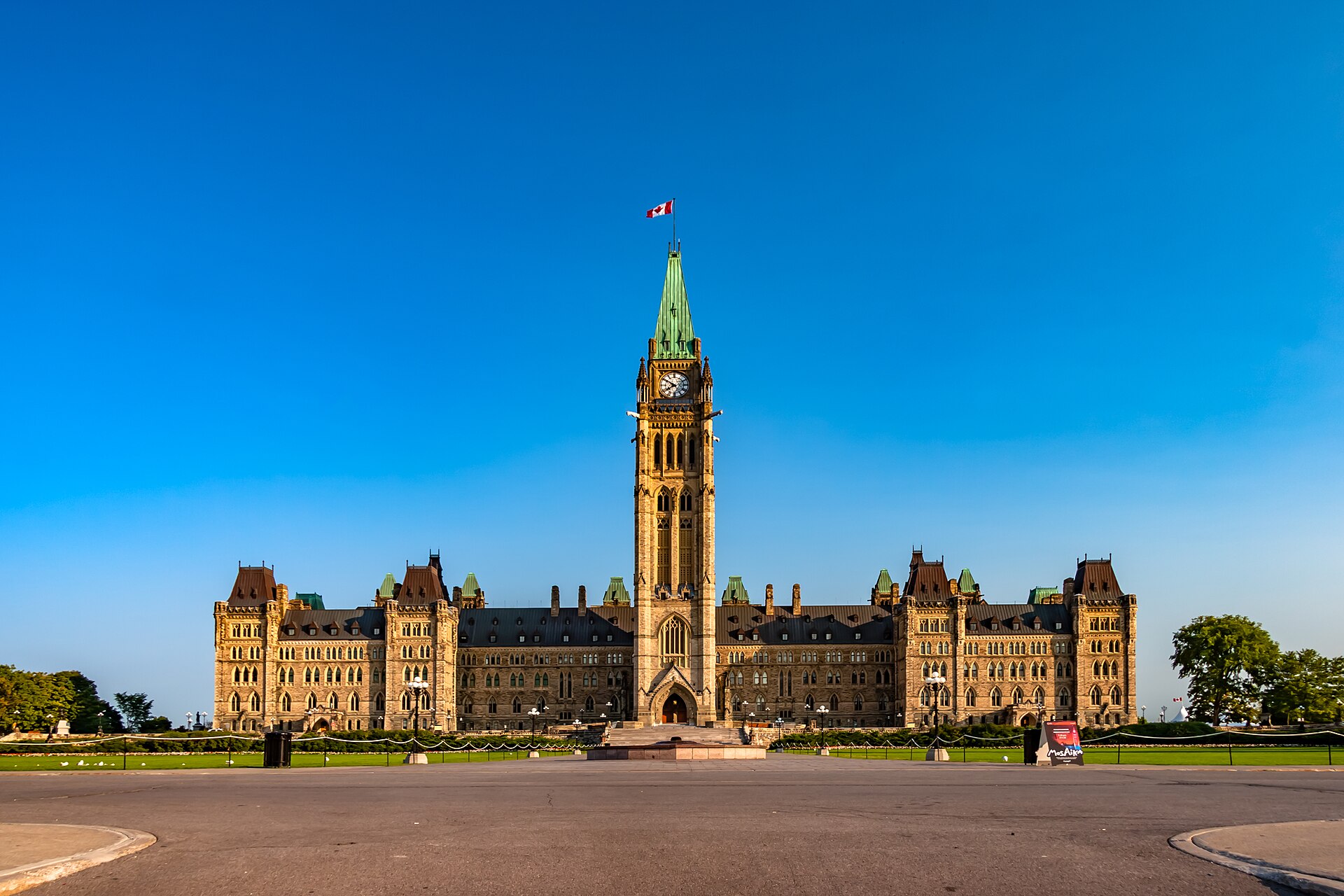 The Centre Block on Parliament Hill in Ottawa flying the Canadian flag, the federal capital in the Alberta referendum results 2026 story