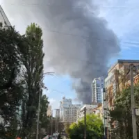 Smoke rising above buildings in Kyiv after the September 23, 2026 Russian attack