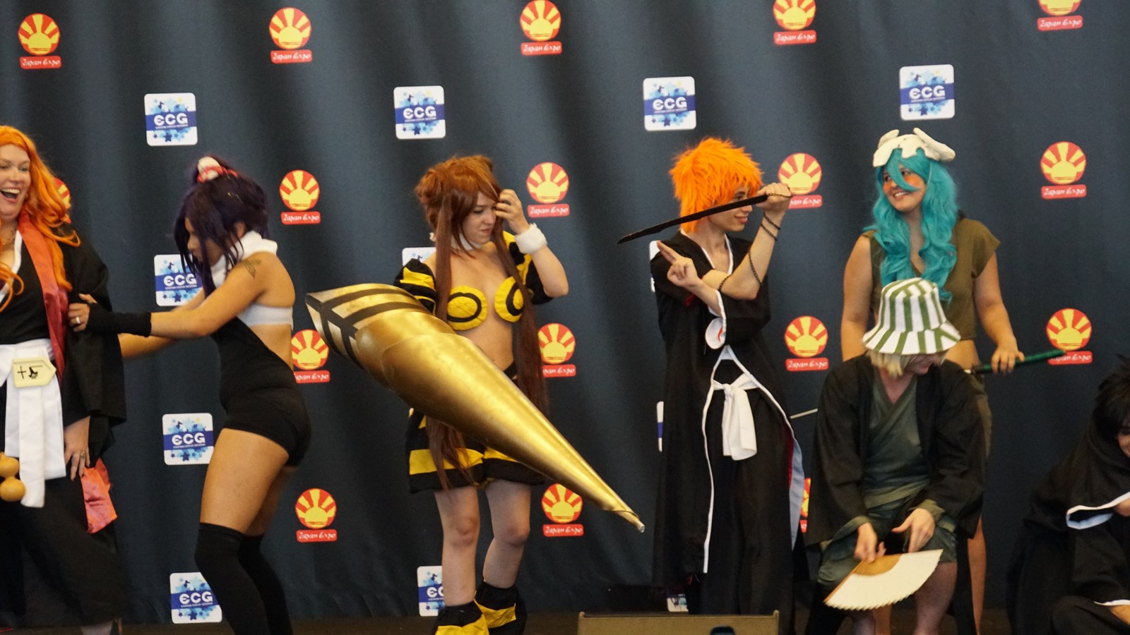 A group of Bleach cosplayers on stage at Japan Expo 2016 in Paris, part of the worldwide fan culture behind the Bleach anime finale
