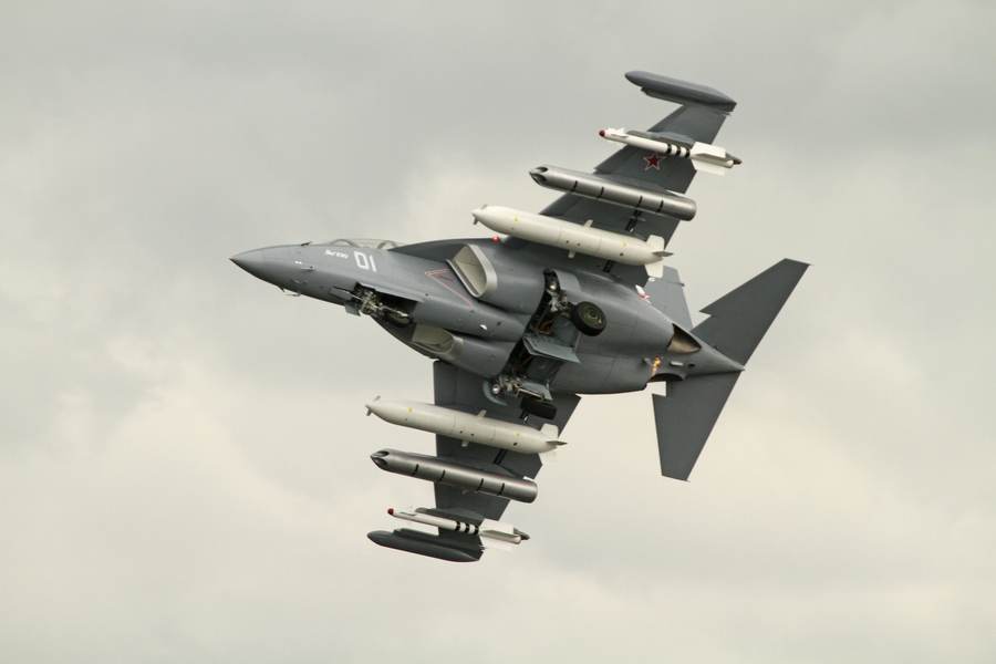 A Yakovlev Yak-130 advanced jet trainer banks in flight during an air display