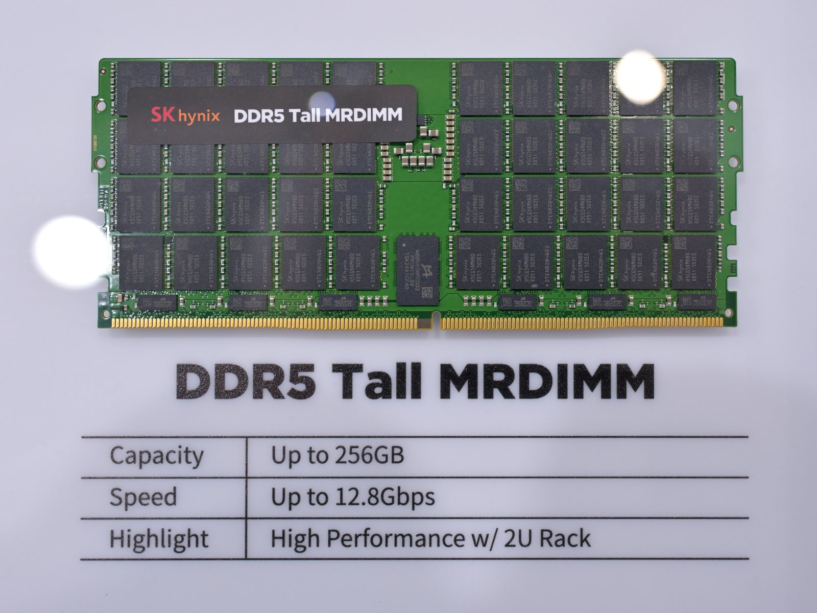 A tall SK hynix DDR5 MRDIMM server memory module, its black chips carrying the SK hynix name, of the kind shipping into AI data centres