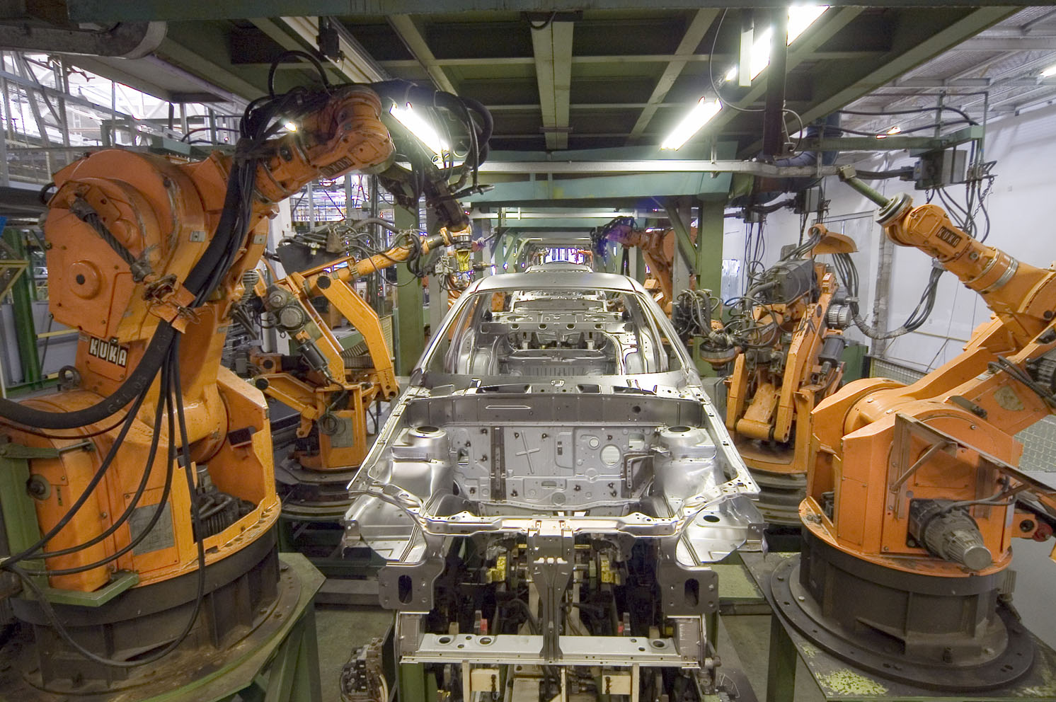 KUKA industrial robots on a production line — the kind of factory automation targeted by Germany's industrial AI push with Nvidia