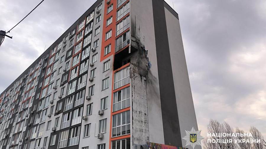 Blast damage to the upper floors of a residential high-rise near Kyiv after a Russian strike