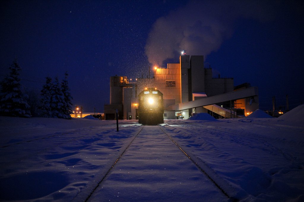 Pentagon FORTRESS plan — a coal train delivers fuel to the power plant at Eielson Air Force Base in Alaska on a snowy night, one of the few US bases that generates much of its own power