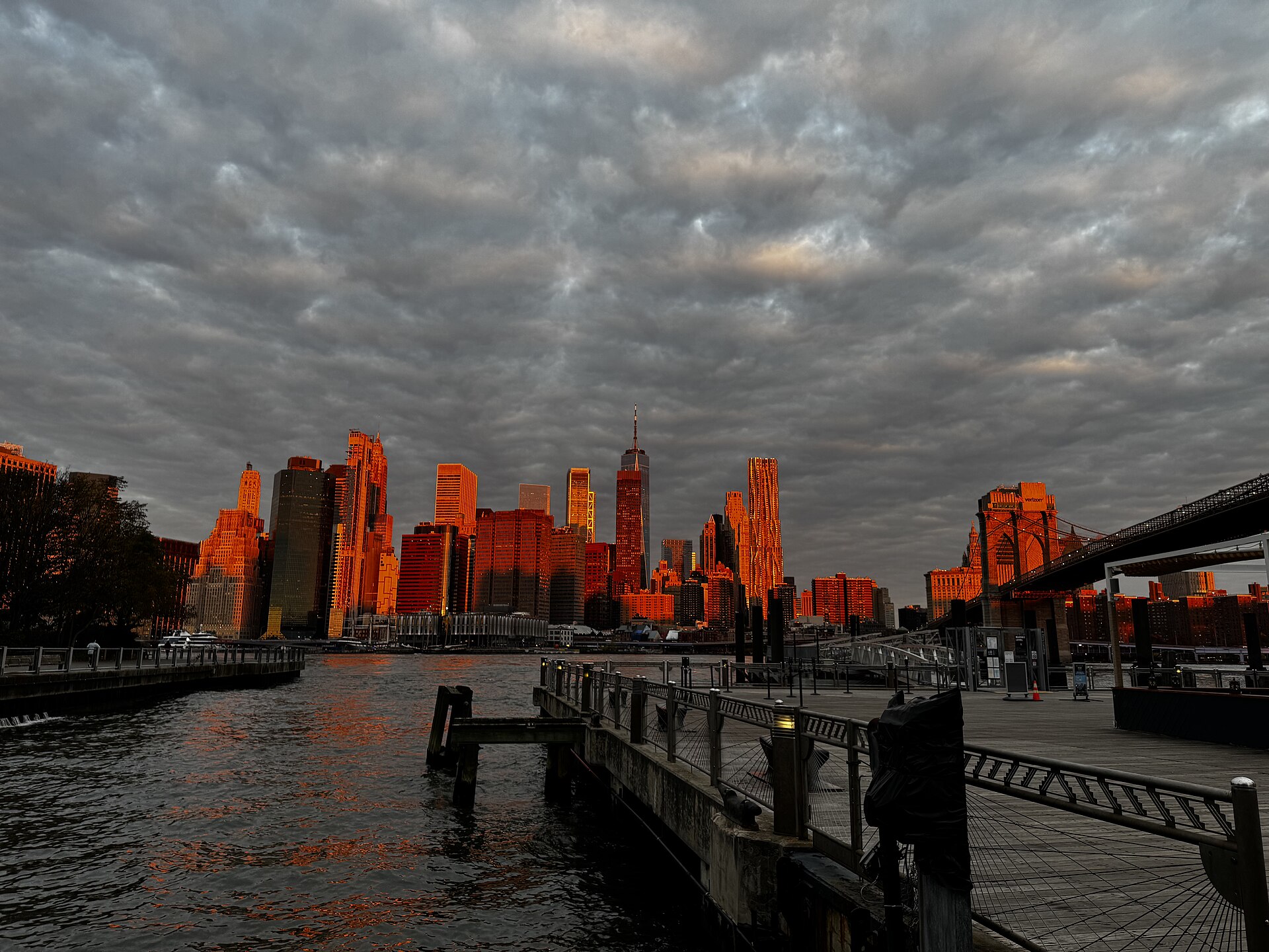 The Manhattan skyline and a Brooklyn Bridge tower seen from Brooklyn Bridge Park — the boroughs linked by the crossing shut down in the ICE protest NYC October 2026