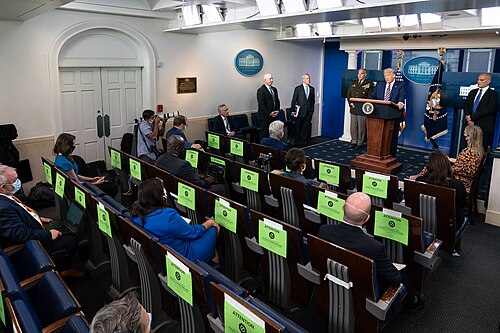 White House press briefing room during an earlier briefing, context for restored CNN Politico and MS NOW press access