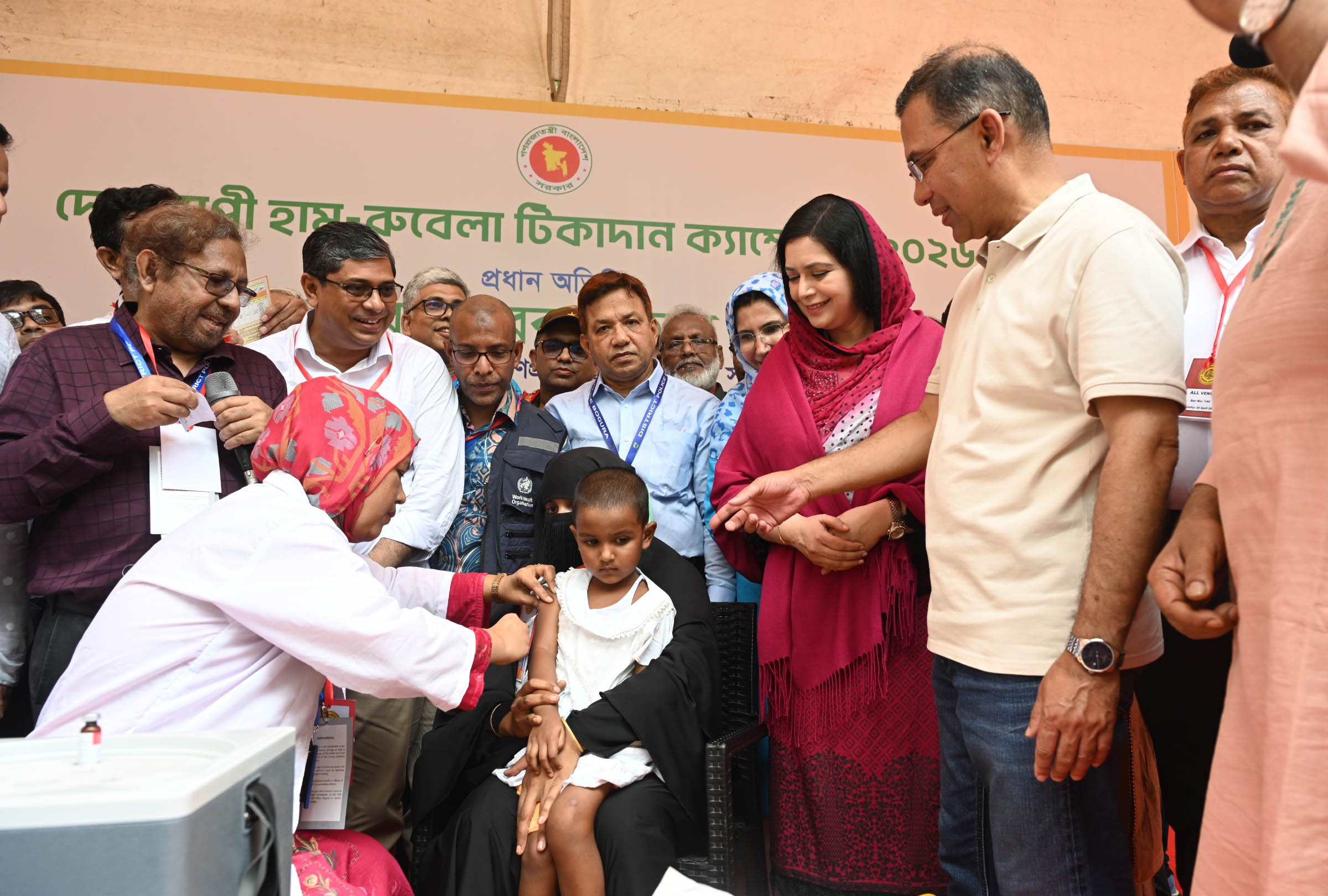 A young child receiving a measles-rubella vaccination in Bogura, Bangladesh during the April 2026 campaign responding to the Bangladesh measles outbreak