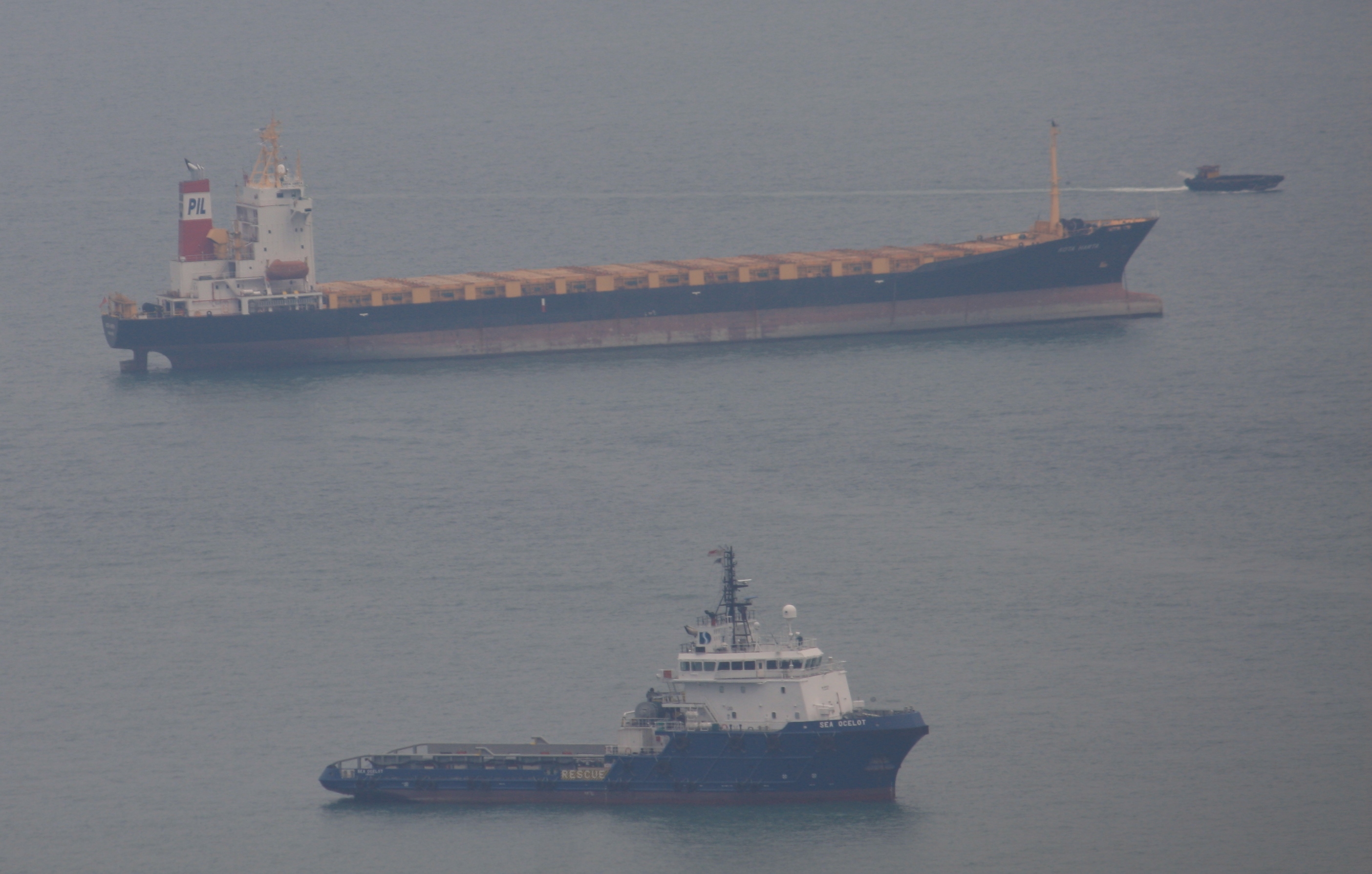 Cargo vessels at anchor in Singapore harbour, the waters serving the Jurong crude storage hub