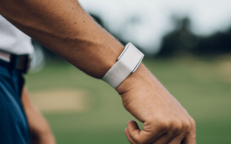 Whoop screenless wearable tracker worn at a PGA Tour event, the category an Apple Whoop competitor would enter