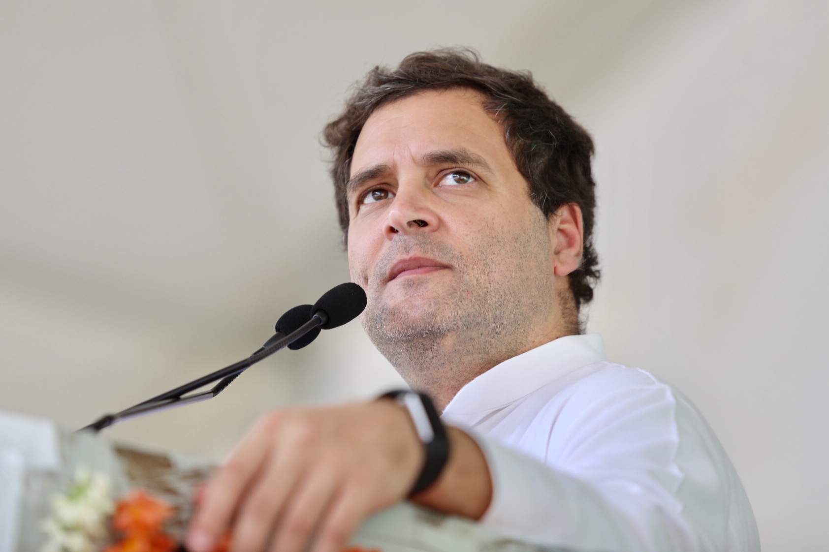 Rahul Gandhi speaking at a podium, acquitted in the Sultanpur defamation case over his 2018 campaign remark