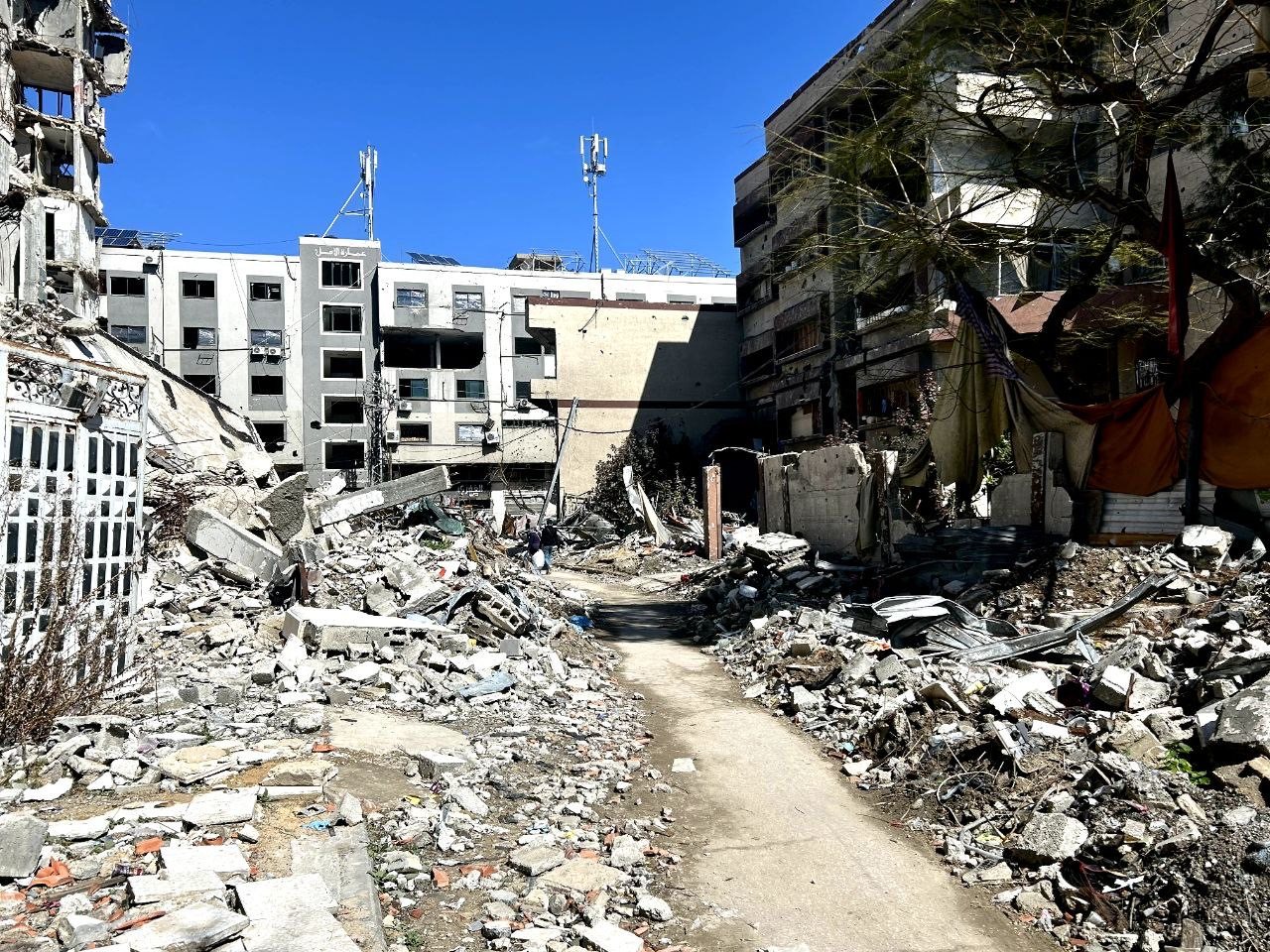 Rubble fills Wehda Street in Gaza City, illustrating the scale of destruction the Board of Peace's $71 billion reconstruction plan must address