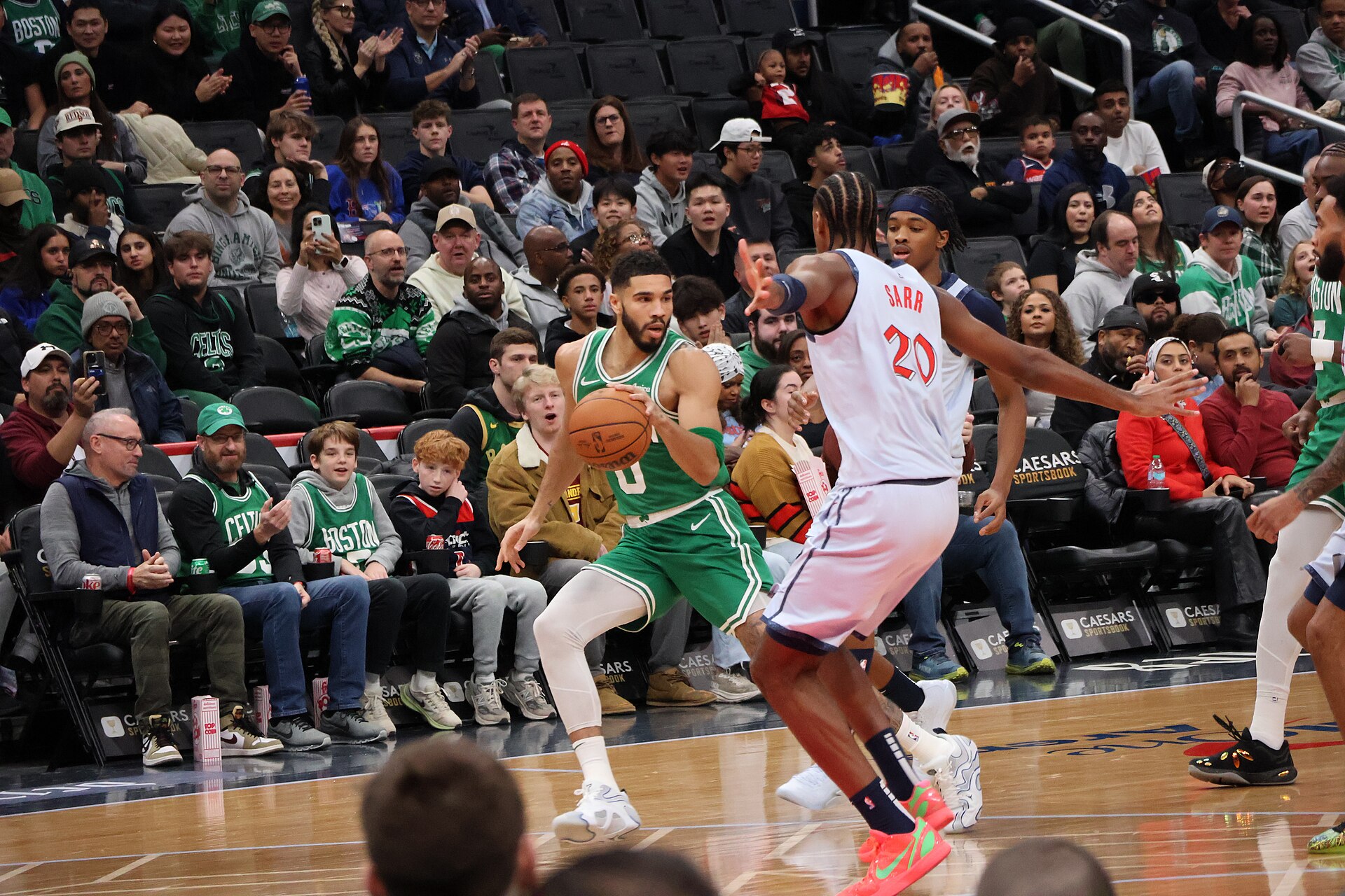 Jayson Tatum 36 points Knicks — Tatum in Boston green holding the ball against a defender
