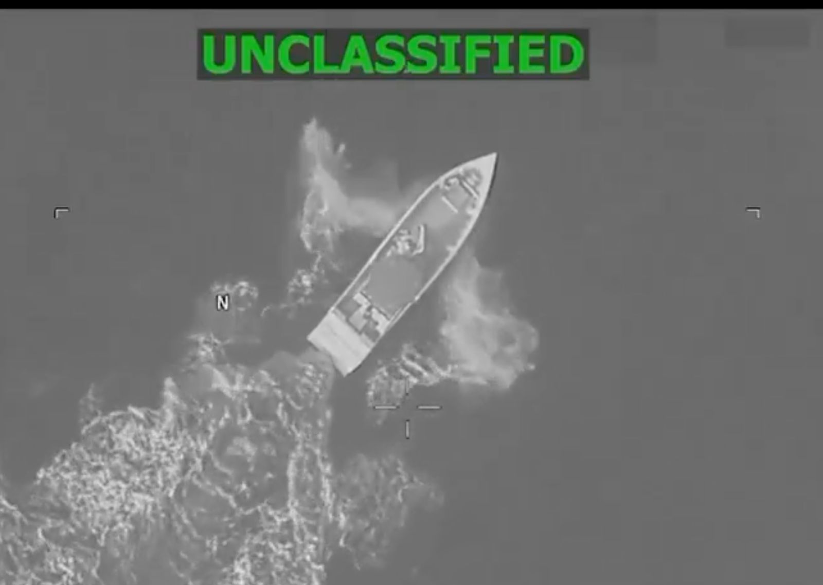 Overhead monochrome frame of a go-fast vessel from video U.S. Southern Command posted with its October 4 strike announcement