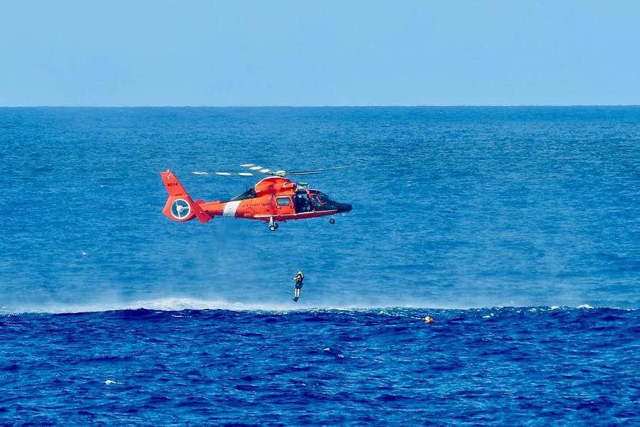 U.S. Coast Guard helicopter conducting an ocean rescue training operation