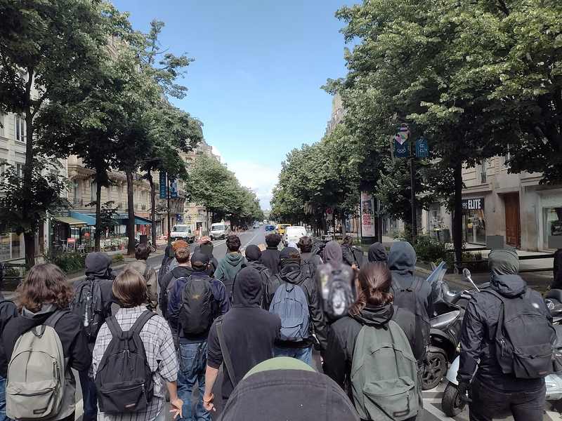 French lycée students marching in Paris during a 2024 demonstration