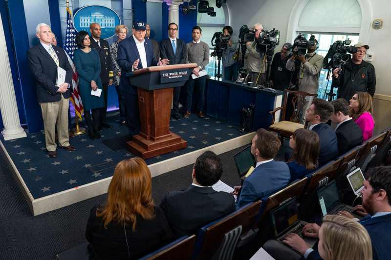 White House press corps in the briefing room, illustrating MS NOW White House credentials and press access