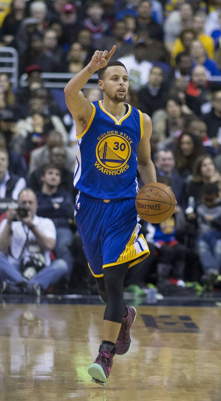 Stephen Curry in a Golden State Warriors uniform — Curry agreed to a two-year, $116 million contract extension in September 2026