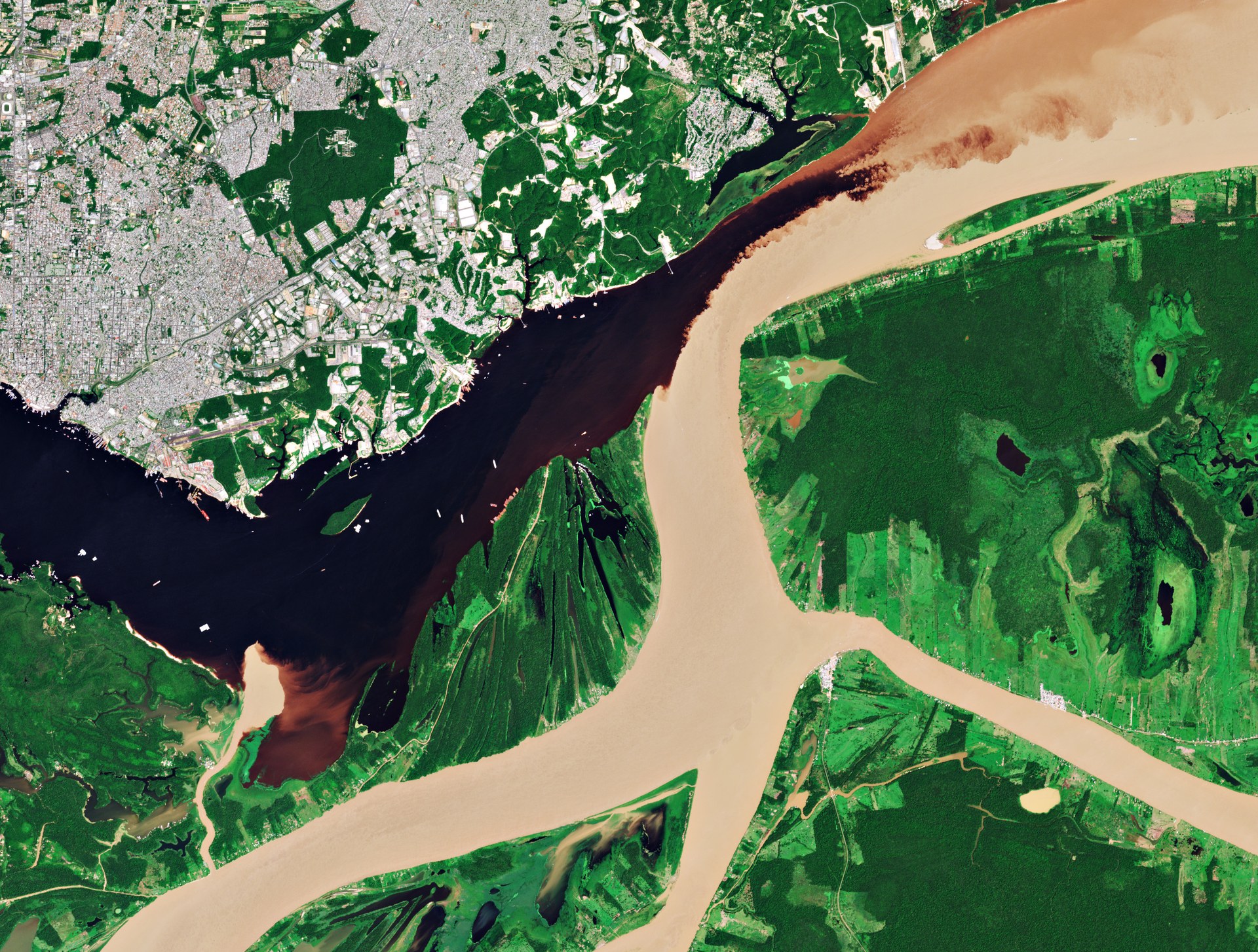 The confluence of the Rio Negro and the Amazon River at Manaus, Brazil, seen from space by the Copernicus Sentinel-2 satellite