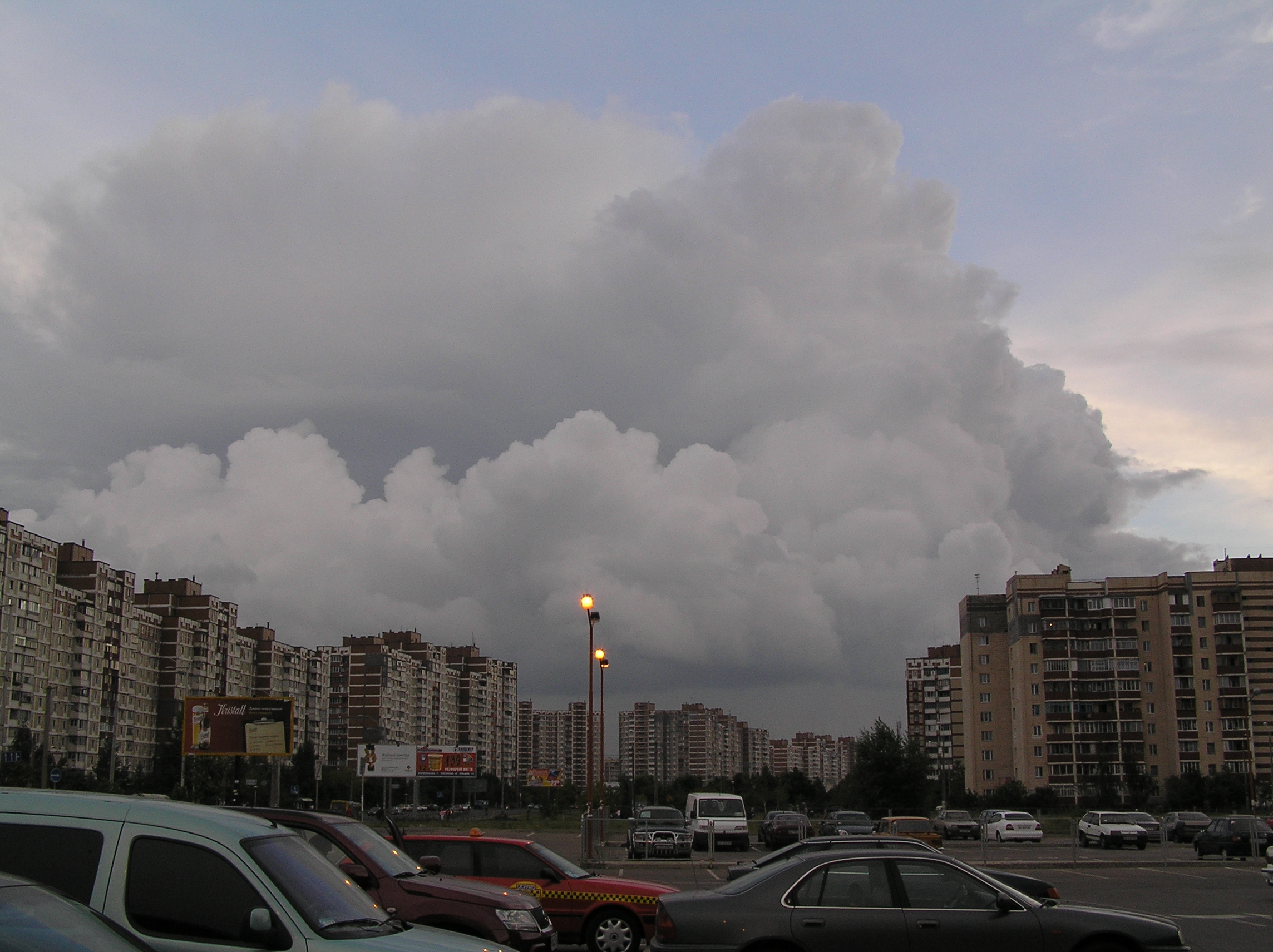 Residential towers in Troieshchyna, Desnianskyi district Kyiv, under storm clouds