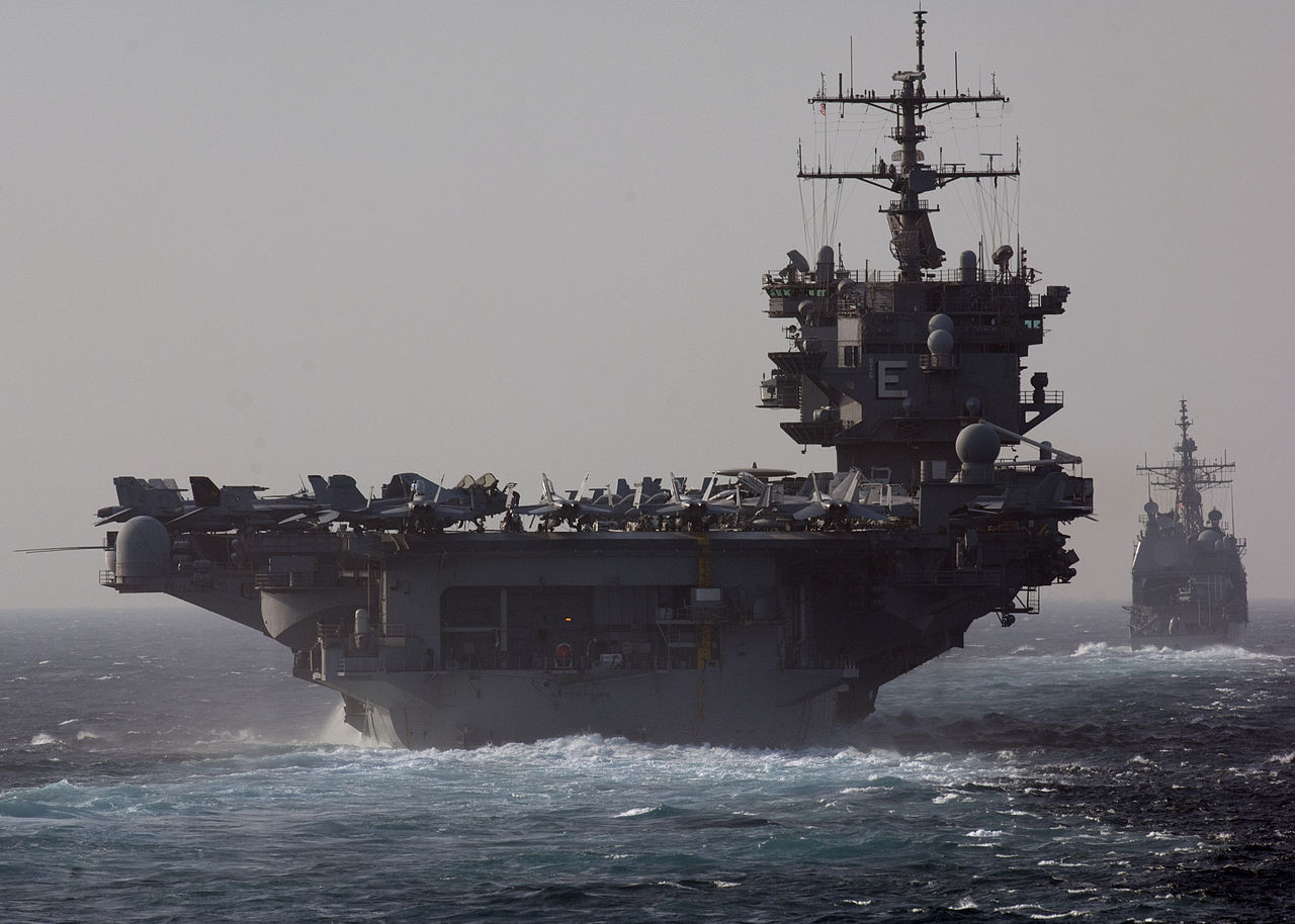 USS Enterprise and USS Vicksburg transit the Bab al-Mandeb Strait in a file image