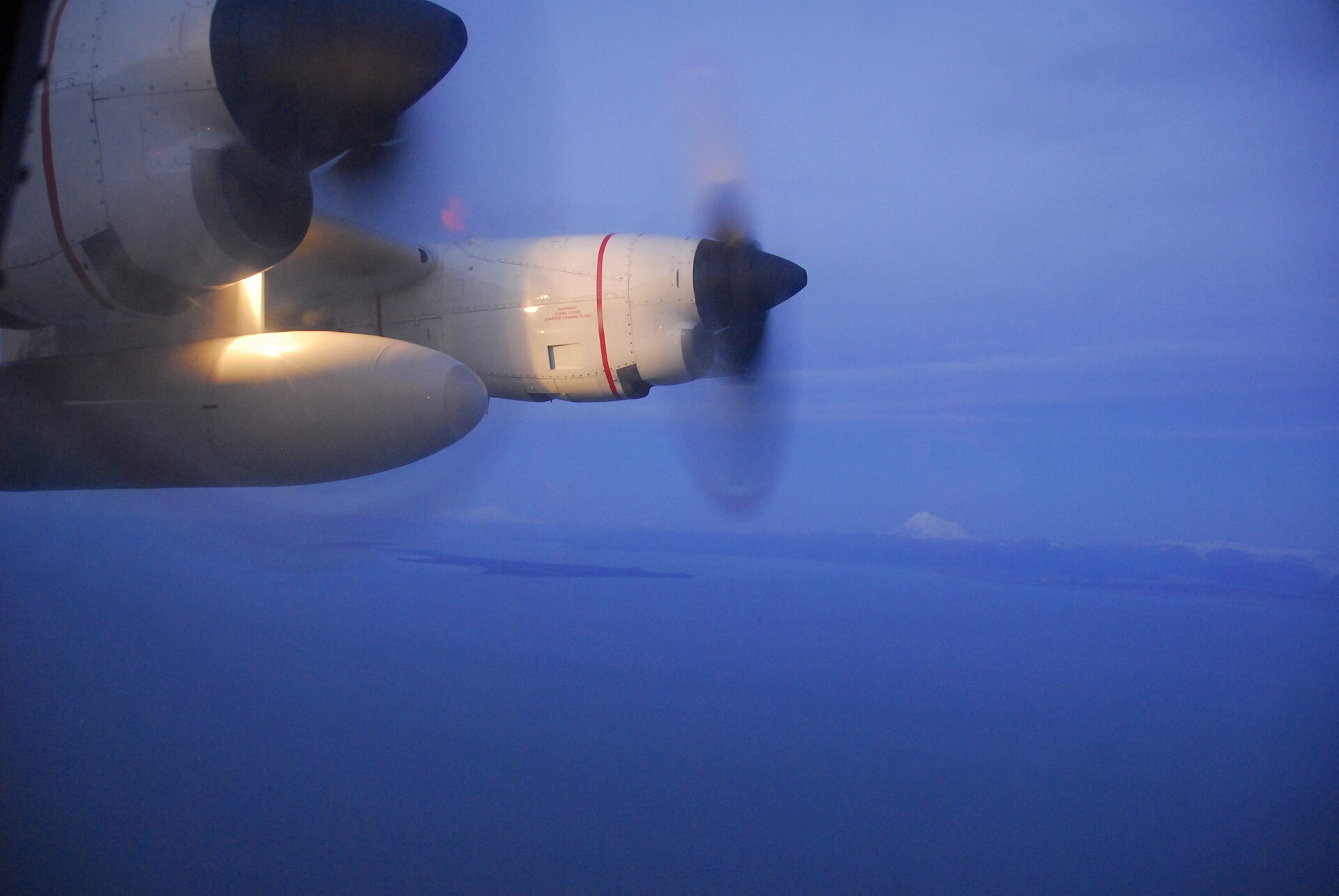 View from a U.S. Coast Guard HC-130 Hercules during a first-light search and rescue flight, file photograph