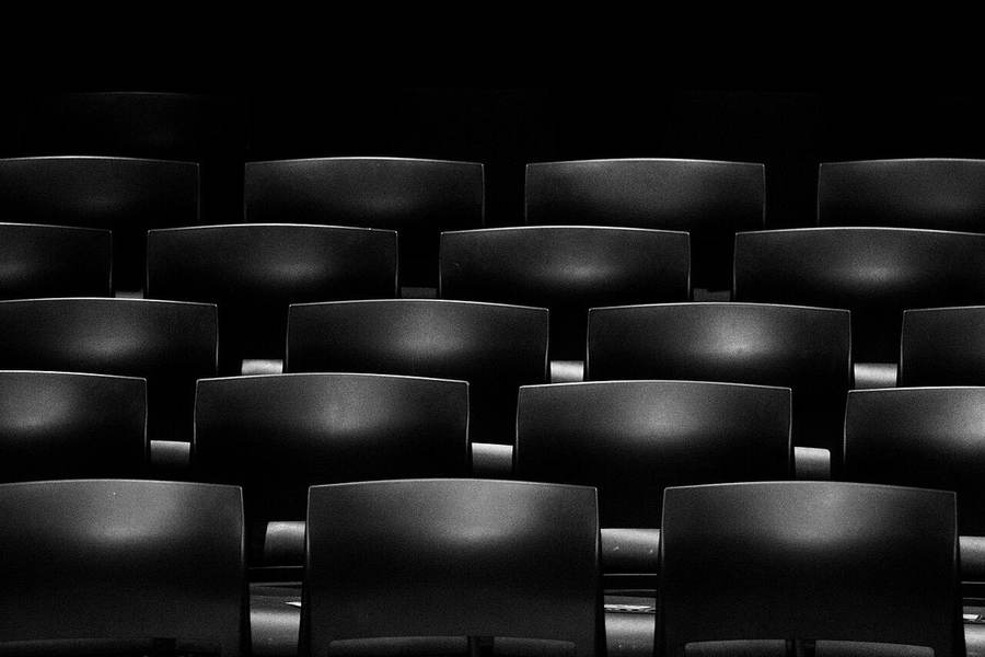 Rows of empty seats in a movie theater