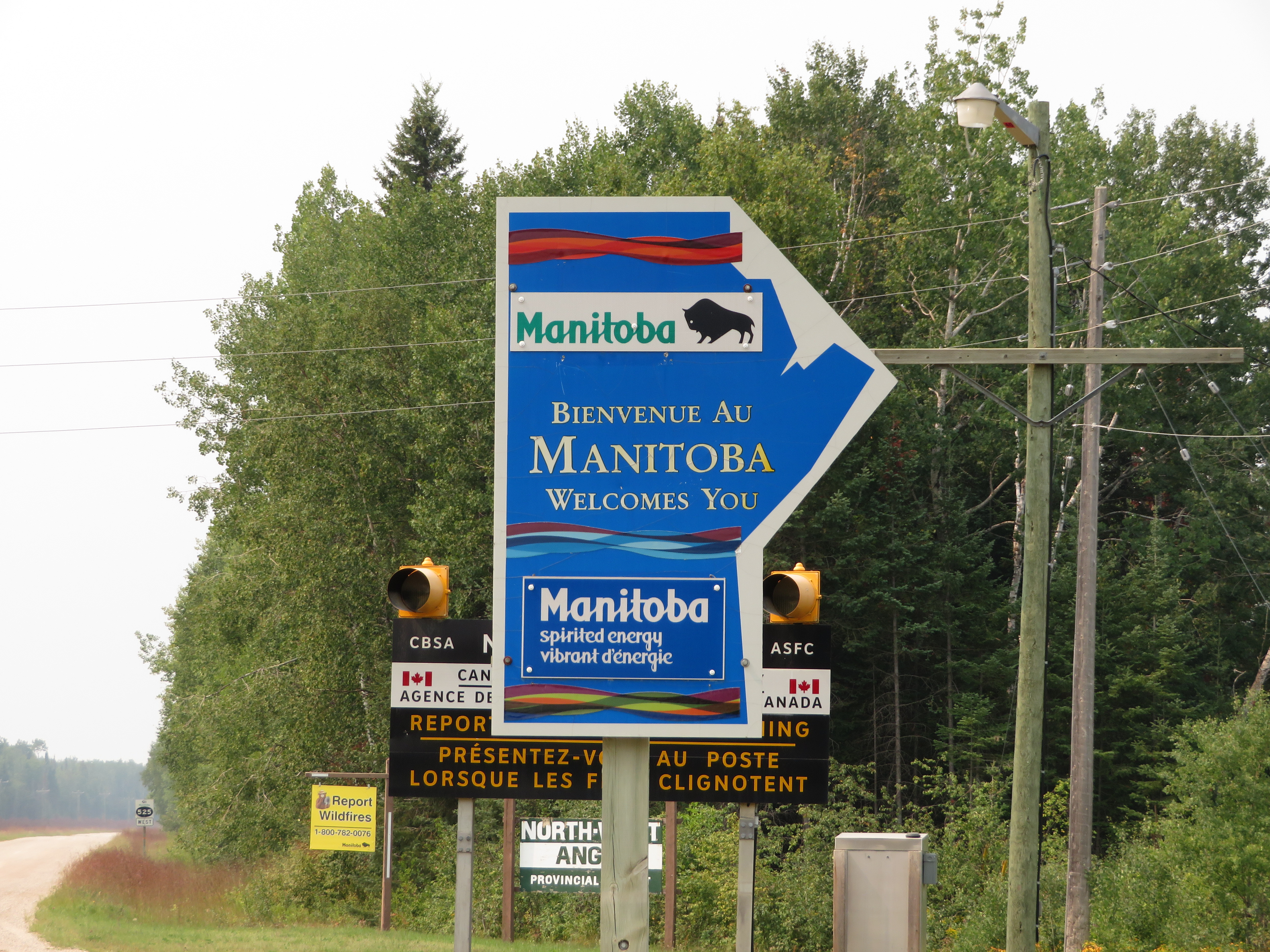 Canada US border crossing welcome sign in Manitoba — the shared border at the centre of the Canada election interference US midterms dispute