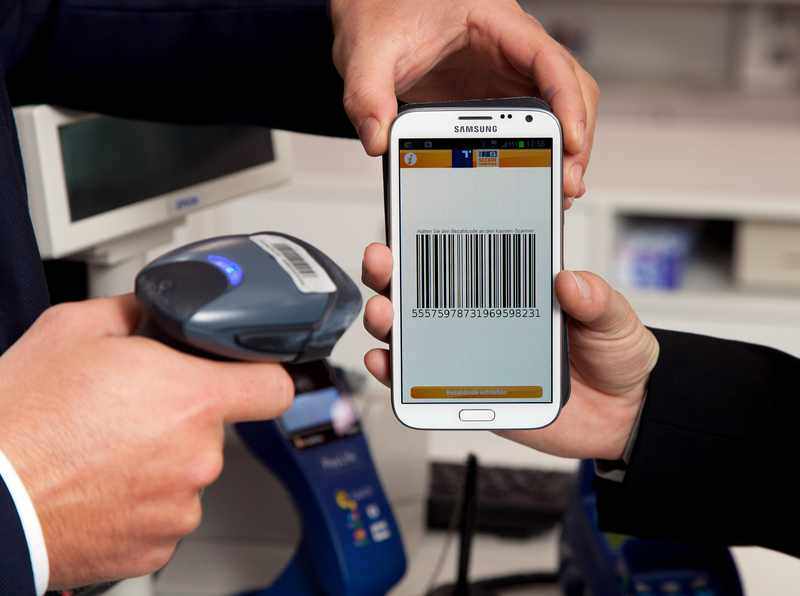 Smartphone making a contactless payment as Apple Pay iPhone India service begins
