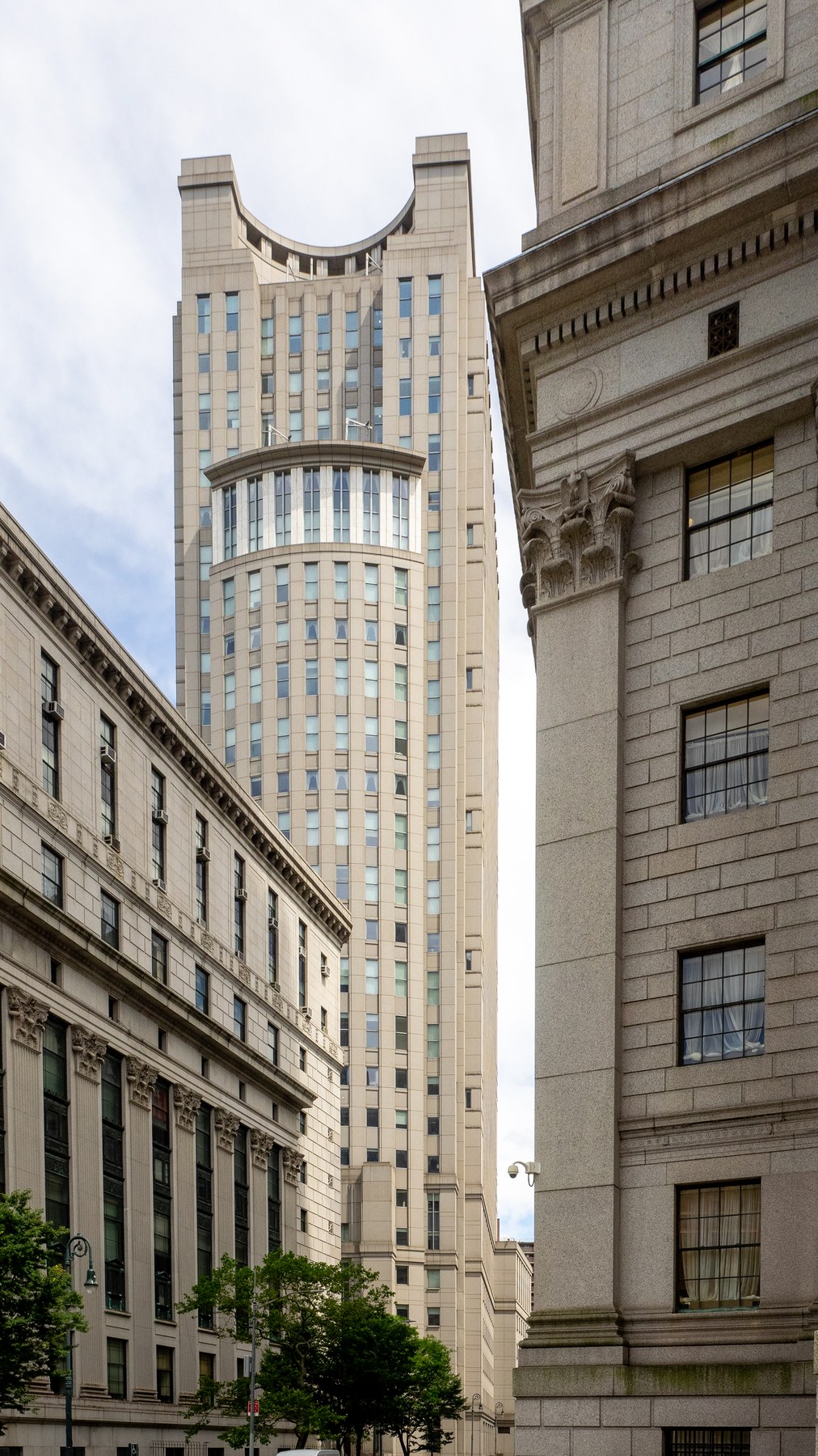 The tower of the Daniel Patrick Moynihan United States Courthouse seen from Foley Square between the neighbouring federal courthouses in Lower Manhattan