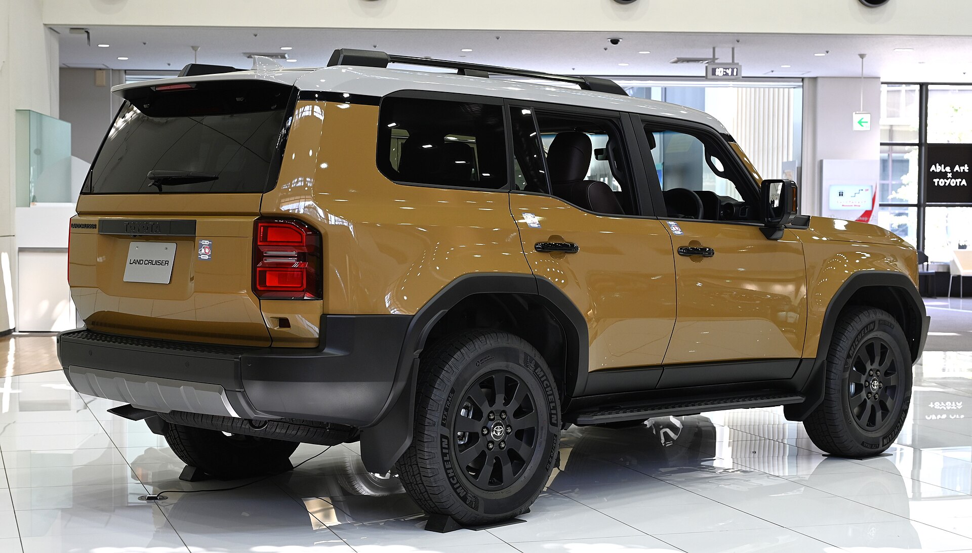 Toyota Land Cruiser hybrid recall — rear view of a Land Cruiser 250 ZX First Edition, showing the rear of the SUV near the fuel tank area