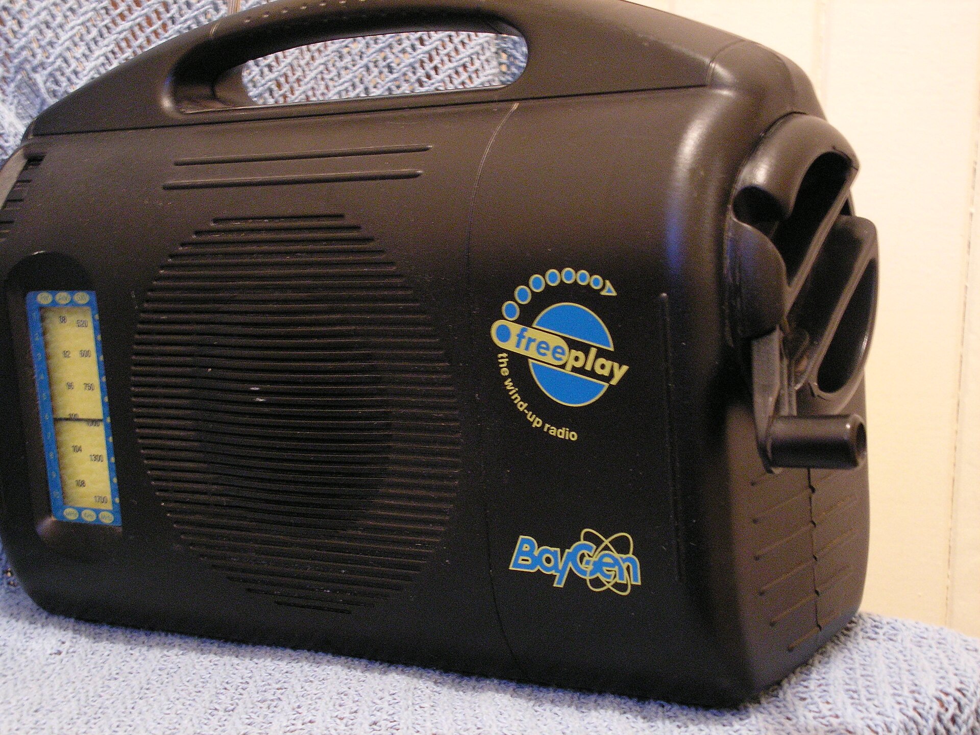 A BayGen Freeplay wind-up radio with its crank handle, the item prepper shops say customers ordered most after the Be Ready announcement