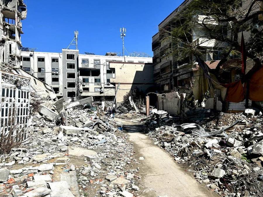 Rubble fills Wehda Street in Gaza City, illustrating the scale of destruction the Board of Peace's $71 billion reconstruction plan must address