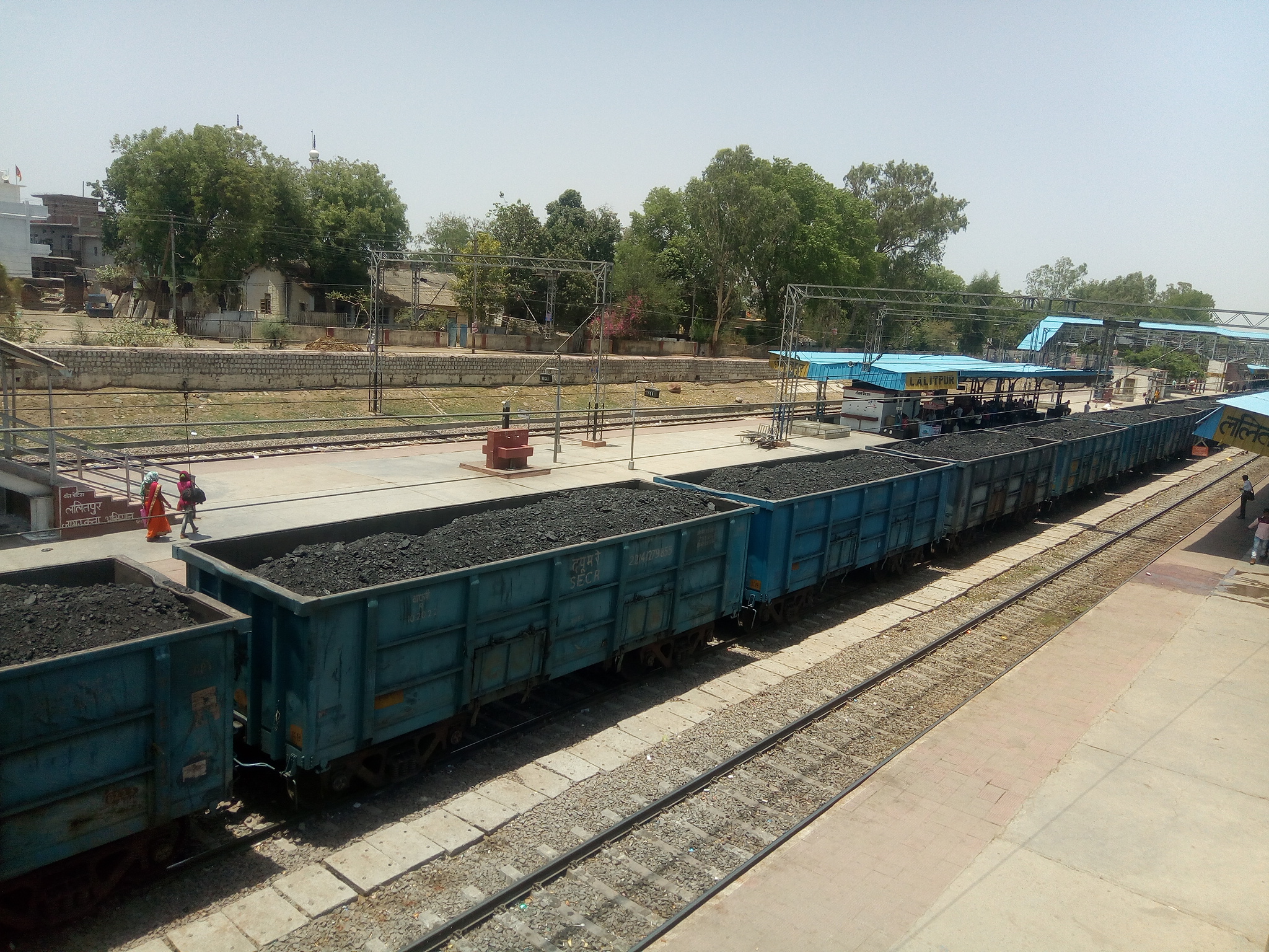 Coal transported by railway in India — rail loading is the chokepoint for rebuilding power plant coal stocks