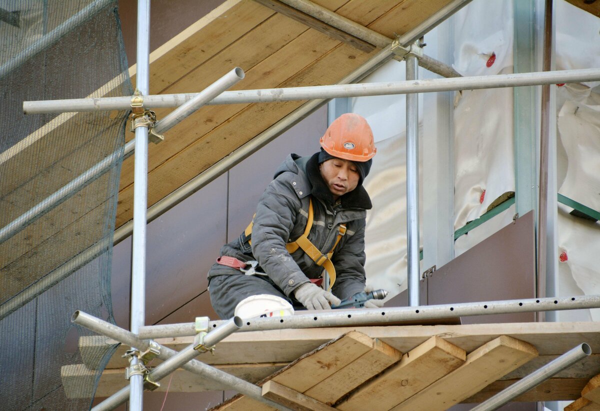 North Korea workers in Russia — a North Korean worker at a construction site near Vladivostok, Russia, in a December 2019 file photo.