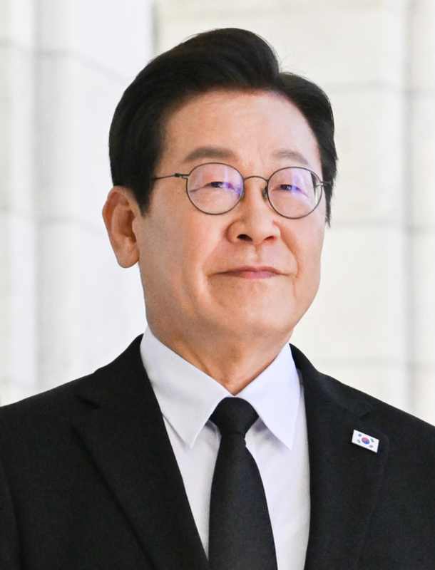 South Korean President Lee Jae Myung walking through Arlington National Cemetery during a 2025 official visit