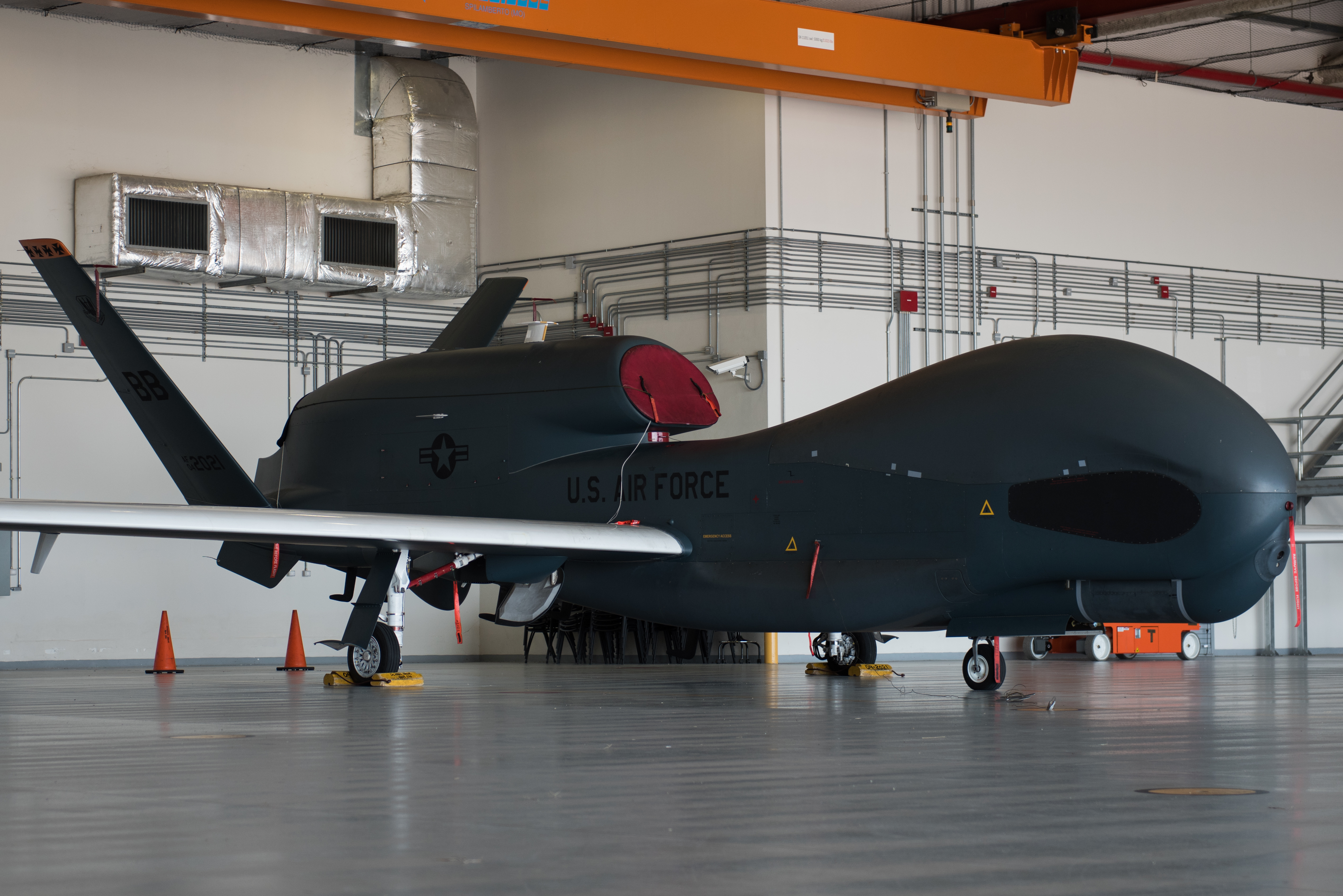 An RQ-4 Global Hawk surveillance aircraft in a hangar at Naval Air Station Sigonella, Italy — file photo for Northrop Grumman Q3 earnings 2026