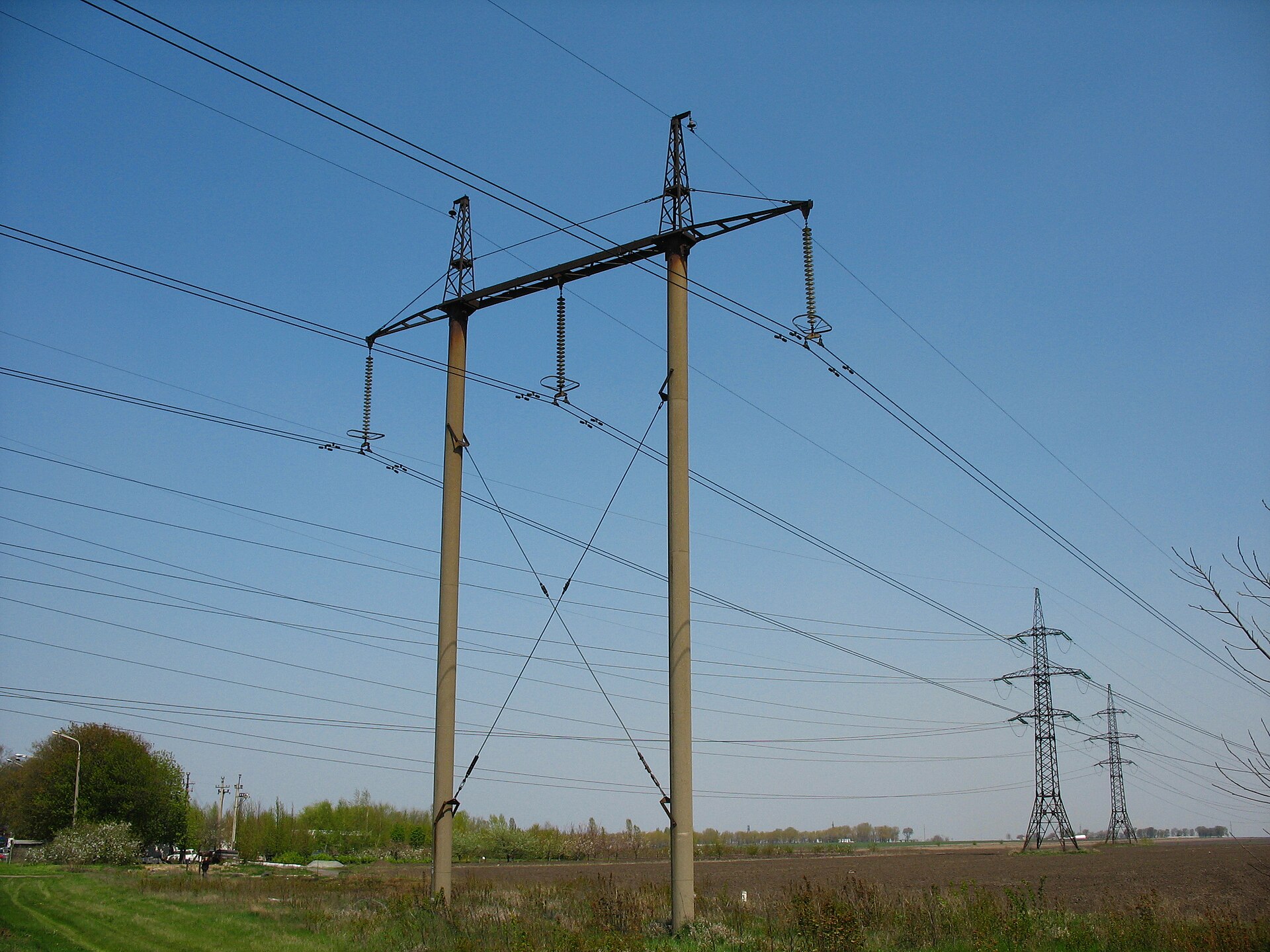 File photo: high-voltage electricity transmission pylons and power lines in Ukraine — a file photograph of Ukraine's power grid, not a photo of infrastructure damaged in the overnight strike