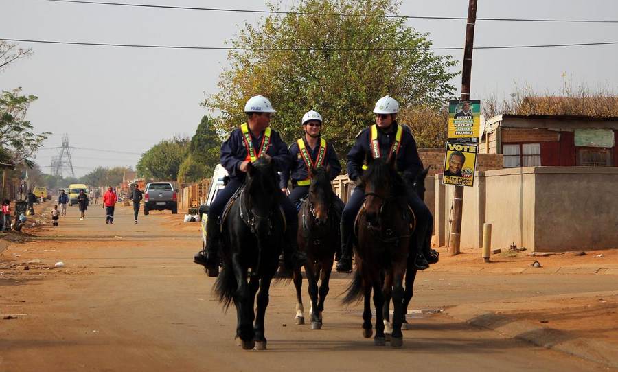 South African Police Service officers respond after the Johannesburg tavern shooting killed 17 people in Wedela township, September 2026