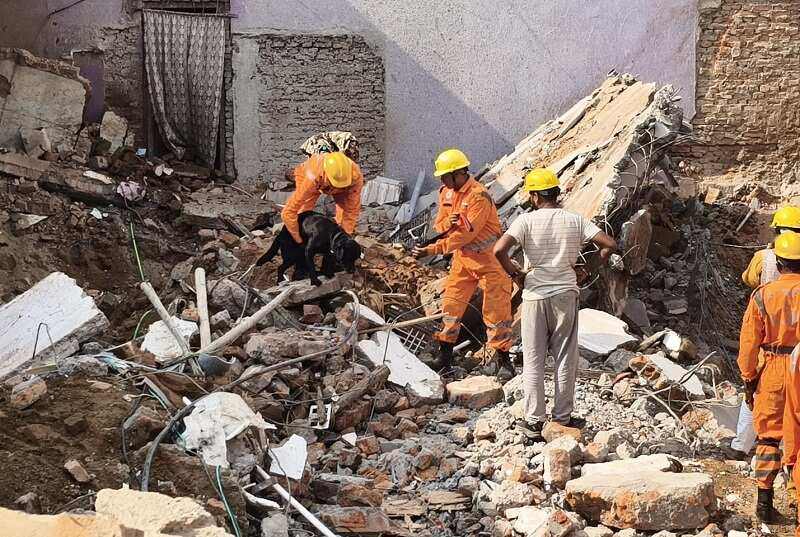 Delhi building collapse October 2026 rescuers searching rubble in New Seemapuri