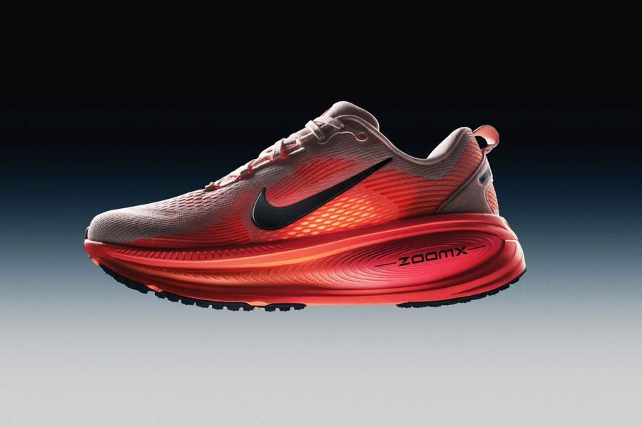 Red Nike Vomero 18 running shoe representing growth in Nike's performance portfolio