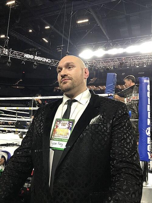 Tyson Fury standing ringside in a file photograph ahead of the confirmed Fury vs Joshua fight date in Cardiff