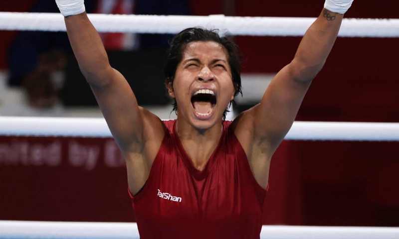 Lovlina Borgohain celebrates in the ring after a Tokyo Olympic bout, ahead of her Asian Games gold breakthrough