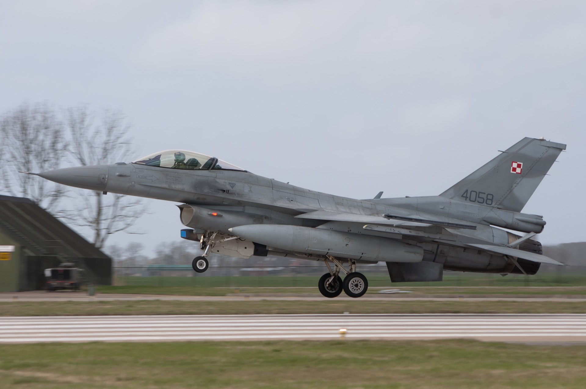Polish Air Force F-16C fighter jet taking off — Poland scrambles aircraft as Russia launches strikes on Ukraine