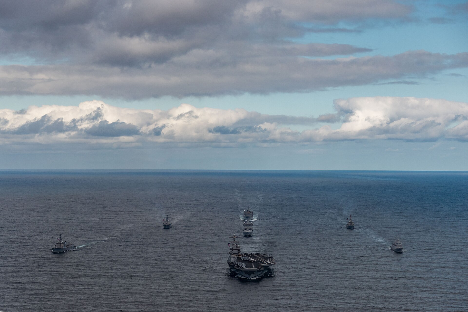 The USS Gerald R Ford carrier strike group sailing in formation with the Norwegian Navy — file photo